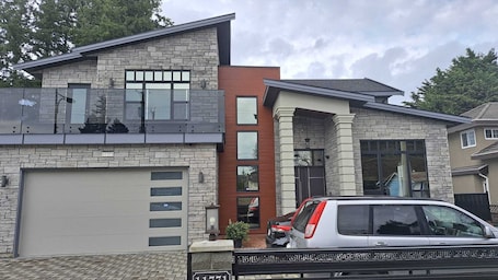 Exterior. One bed room Executive Suite with private entry and living Room and Kitchenet
