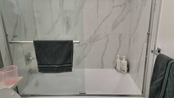Hair dryer, towels, soap, toilet paper