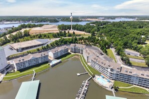 An aerial view of a hotel complex with multiple buildings, a marina, and a lake. - THE BEST of Parkview Bay! 4 Bed + Loft, 3 Bath Top-Floor Condo, 2 Master Suites! (Osage Beach)