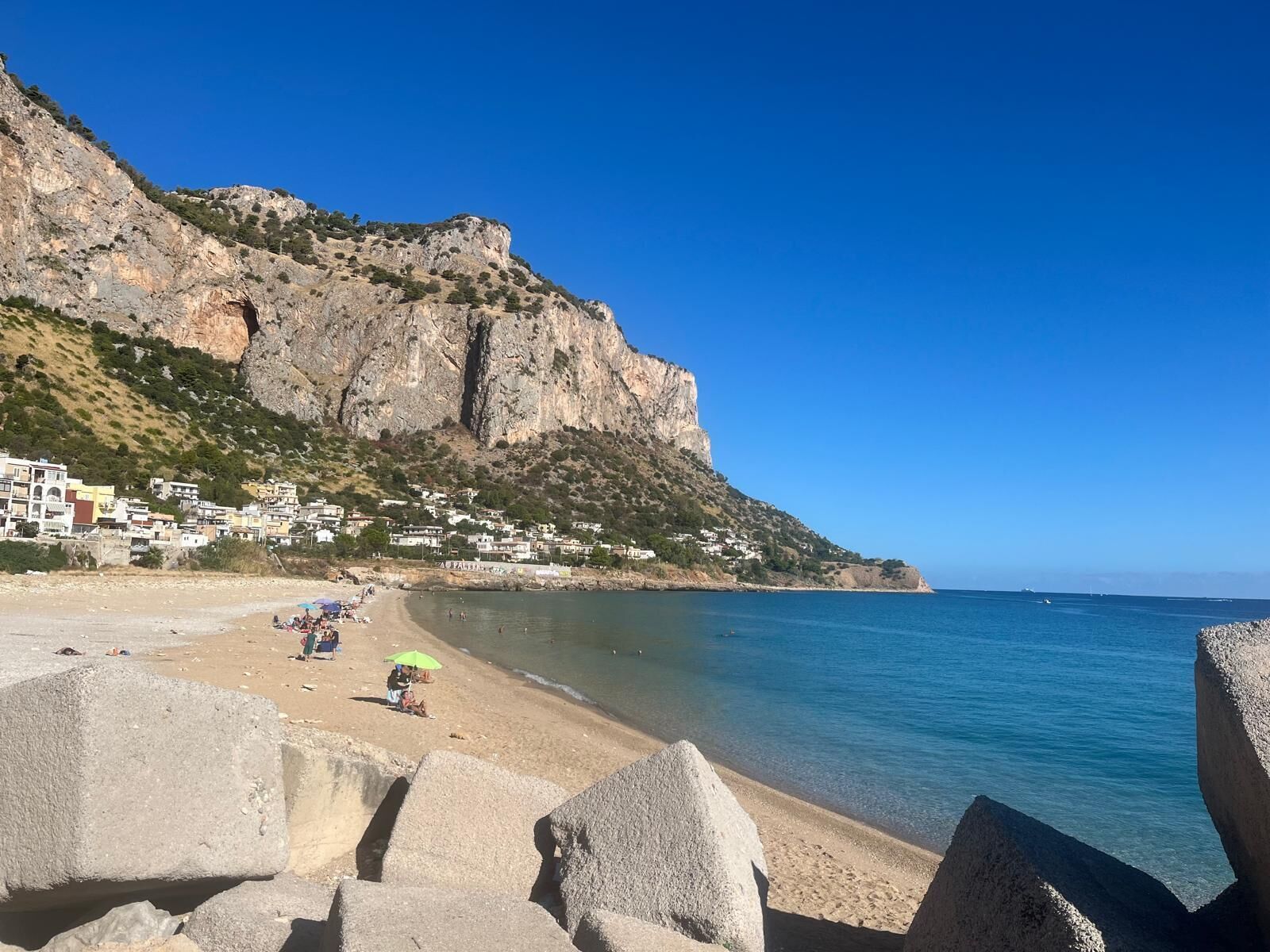 On the beach, sun-loungers, beach towels