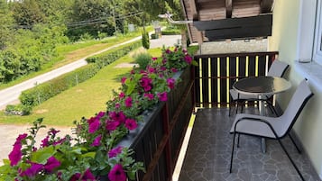 Double Room, Balcony, Garden View | Outdoor dining