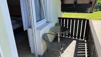 Double Room, Balcony, Courtyard View | Outdoor dining