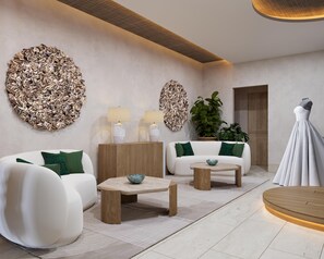 A modern living room with a sofa set, two side tables, a dress form, and decorative wall art. - Park Hyatt Riviera Maya - All Inclusive (Puerto Morelos)
