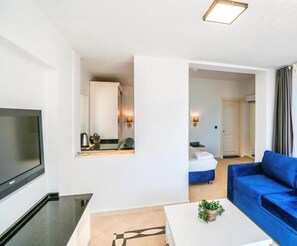 Suite Deluks, balkon, pemandangan gunung | Area keluarga