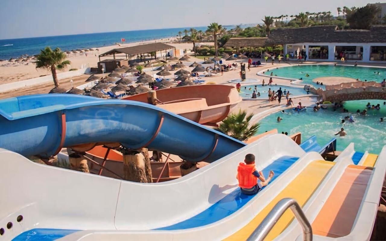 Indoor pool, seasonal outdoor pool, pool umbrellas, lifeguards on site