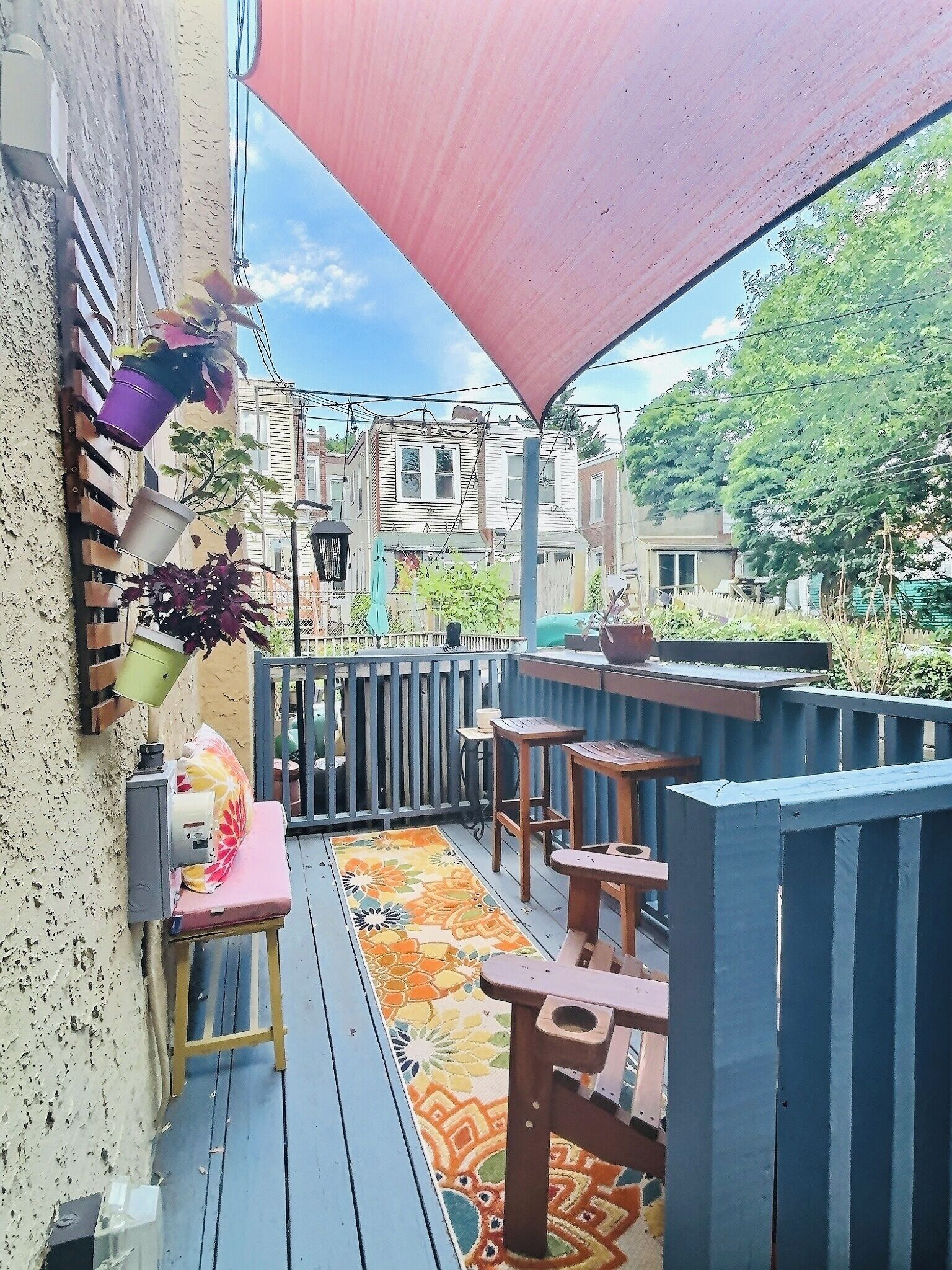 Back deck with grill down the steps.