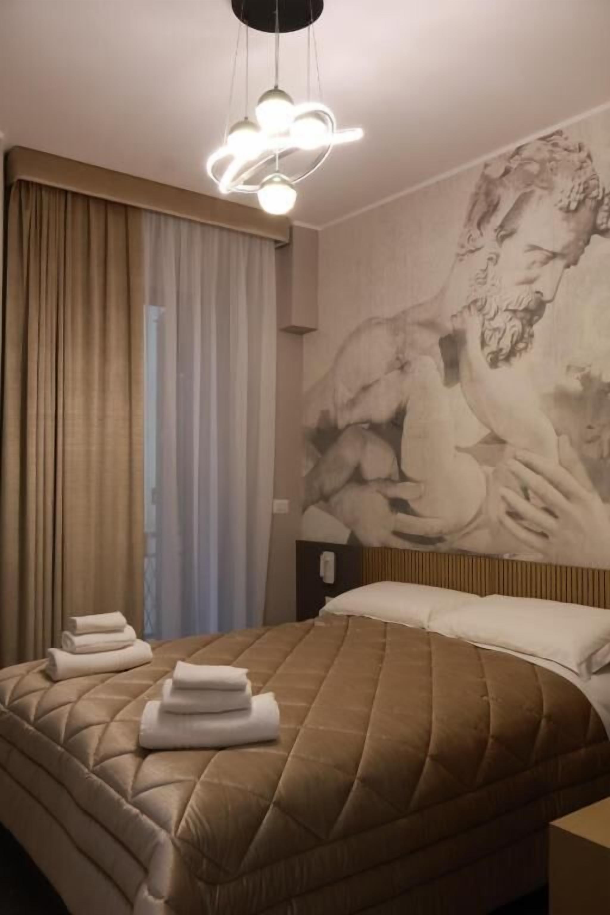 Deluxe Triple Room, Balcony, Courtyard View | In-room safe, desk, iron/ironing board, free WiFi