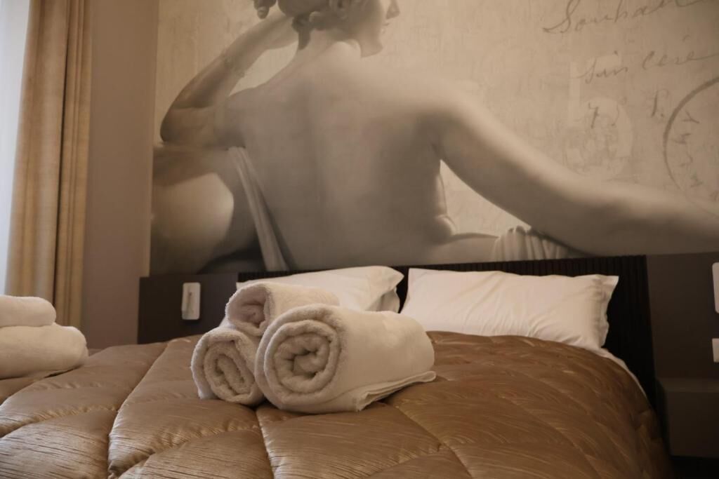 Deluxe Double Room, Courtyard View | In-room safe, desk, iron/ironing board, free WiFi