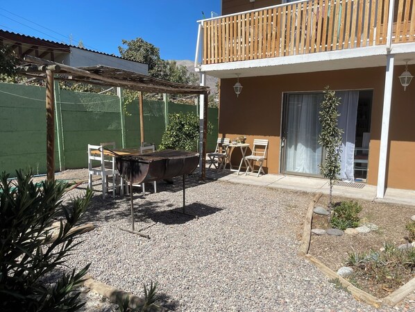 Standard Apartment, Patio, Pool View | Outdoor dining
