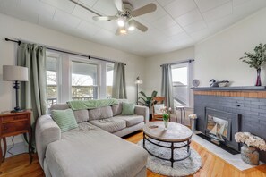 TV, fireplace, books
