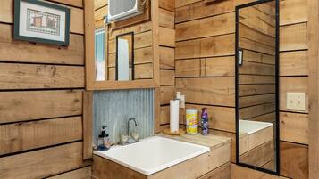 Shower, towels, soap, toilet paper