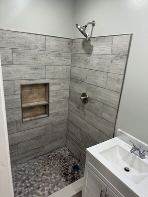 Shower, towels, toilet paper