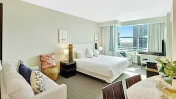 Comfort Condo, City View | Living area | 50-inch Smart TV with digital channels