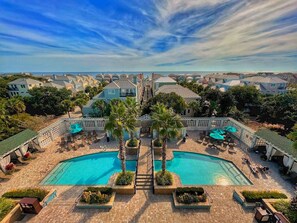 A resort with a central swimming pool, lounge areas, and a view of the surrounding neighborhood. - Wild Dunes Vacation Homes 5-7 Bedrooms (Isle of Palms)