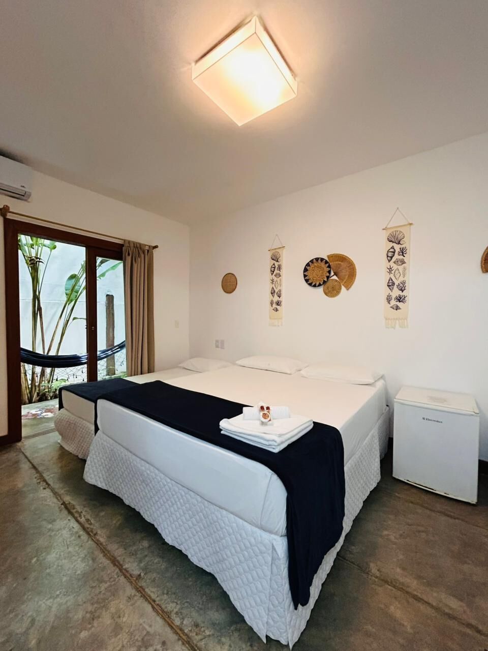 Family Room, Lanai, Garden View | Blackout drapes, free WiFi