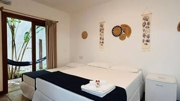 Family Room, Lanai, Garden View | Blackout drapes, free WiFi
