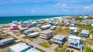 A coastal residential area with houses, a beach, and the ocean. - New listing! Private pool, steps to the beach (Gulf Shores)