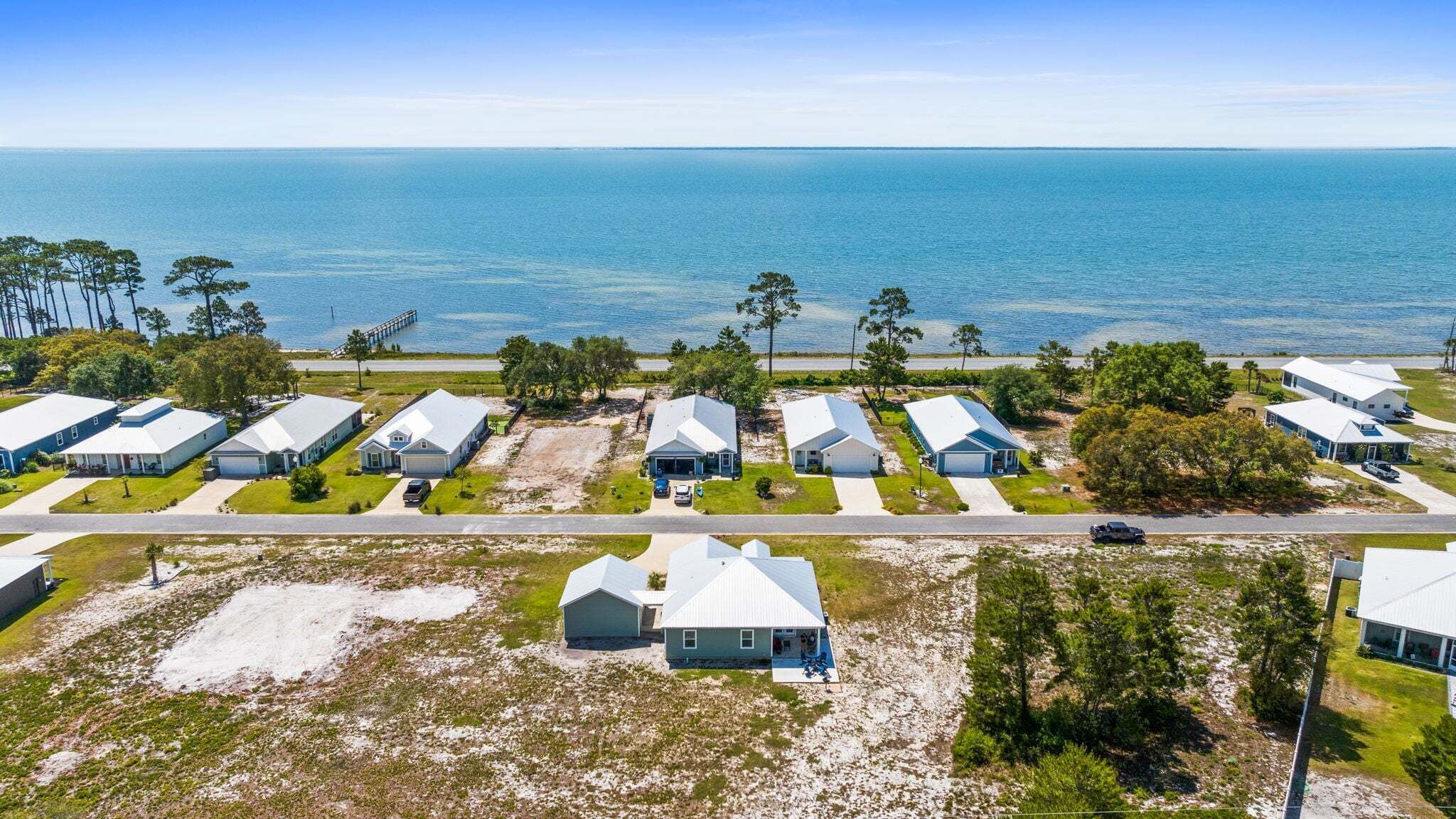 This home sits just steps from the peaceful waters of St. George Sound, offering easy access to scenic views and coastal breezes.