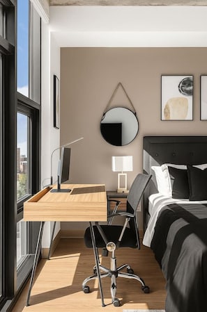A modern hotel room with a desk, chair, bed, and large windows. - Bright + Airy Studio | Perfect City Escape 15 (Birmingham)