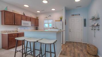Coffee/tea maker, fridge, microwave, oven