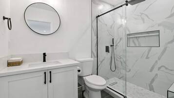 Hair dryer, towels, soap, toilet paper