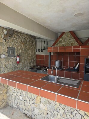 Mini-fridge, microwave, cookware/dishes/utensils