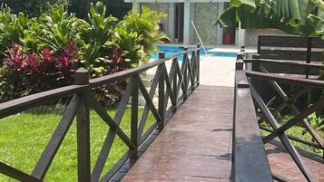 Outdoor pool, pool umbrellas, sun loungers