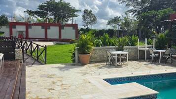 Outdoor pool, pool umbrellas, pool loungers