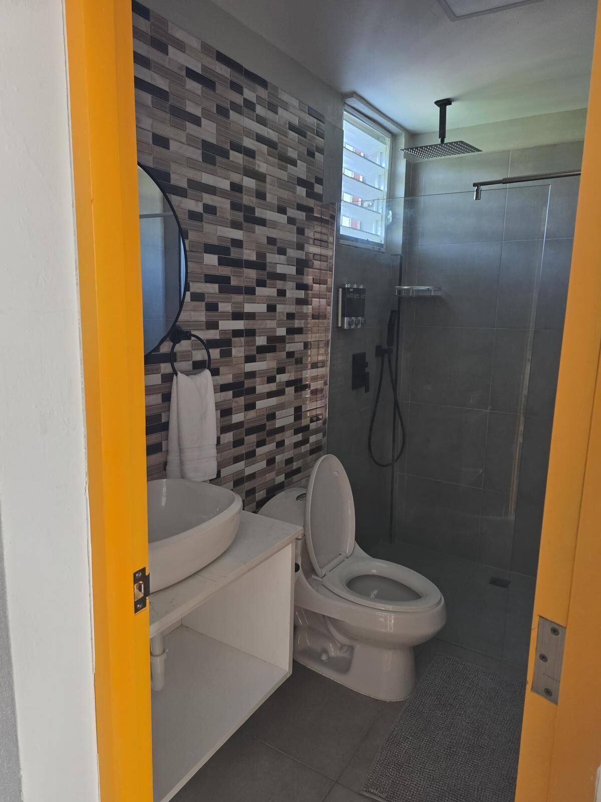 Family Room, 1 King Bed with Sofa bed, Balcony, Courtyard View | Bathroom | Shower, towels, soap, shampoo