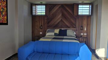Family Room, 1 King Bed with Sofa bed, Balcony, Courtyard View | Desk, laptop workspace, free WiFi