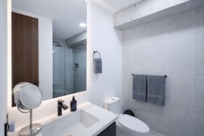 Hair dryer, towels, soap, toilet paper