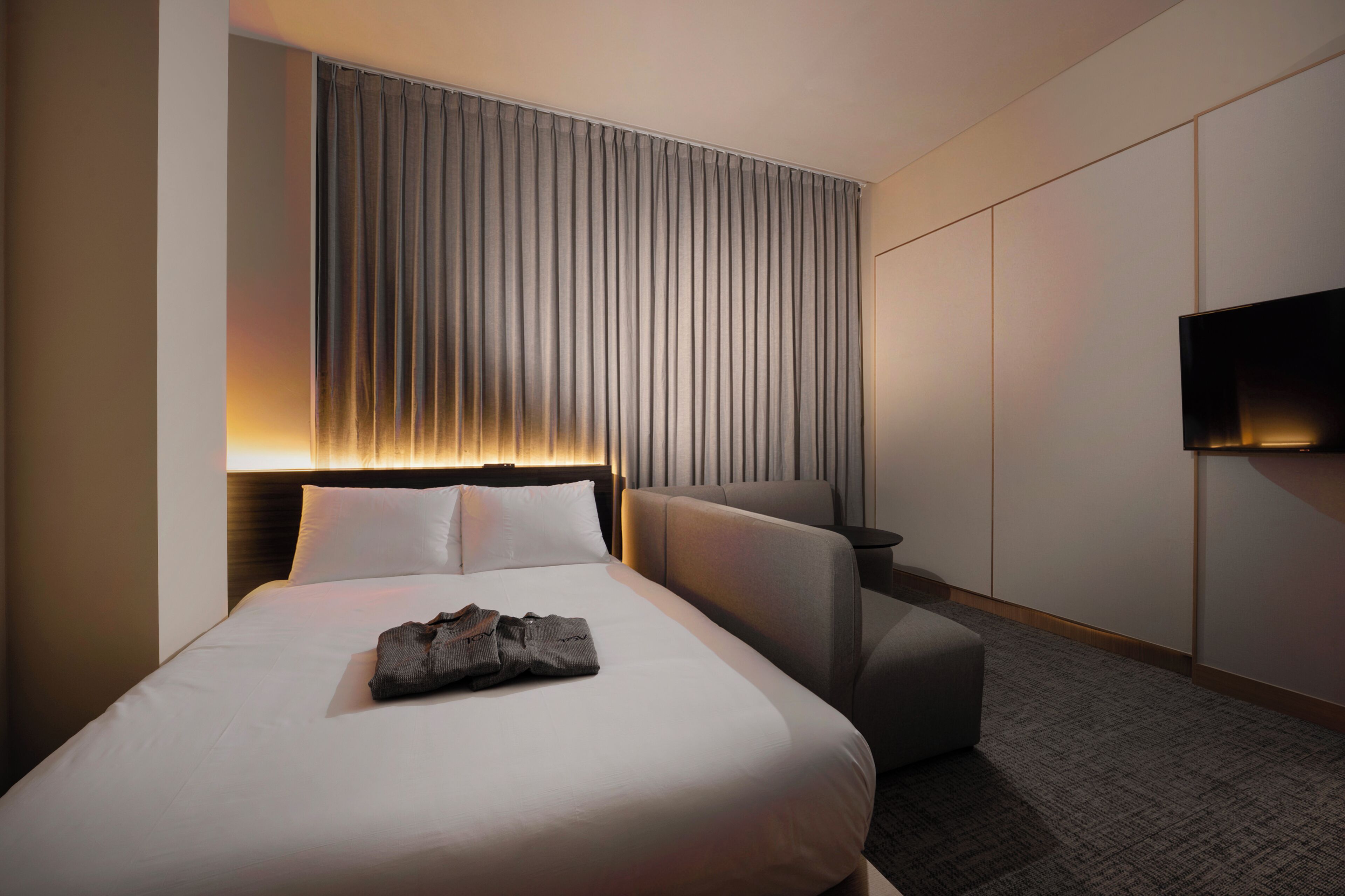 Duplex Family | Premium bedding, down comforters, Select Comfort beds, in-room safe