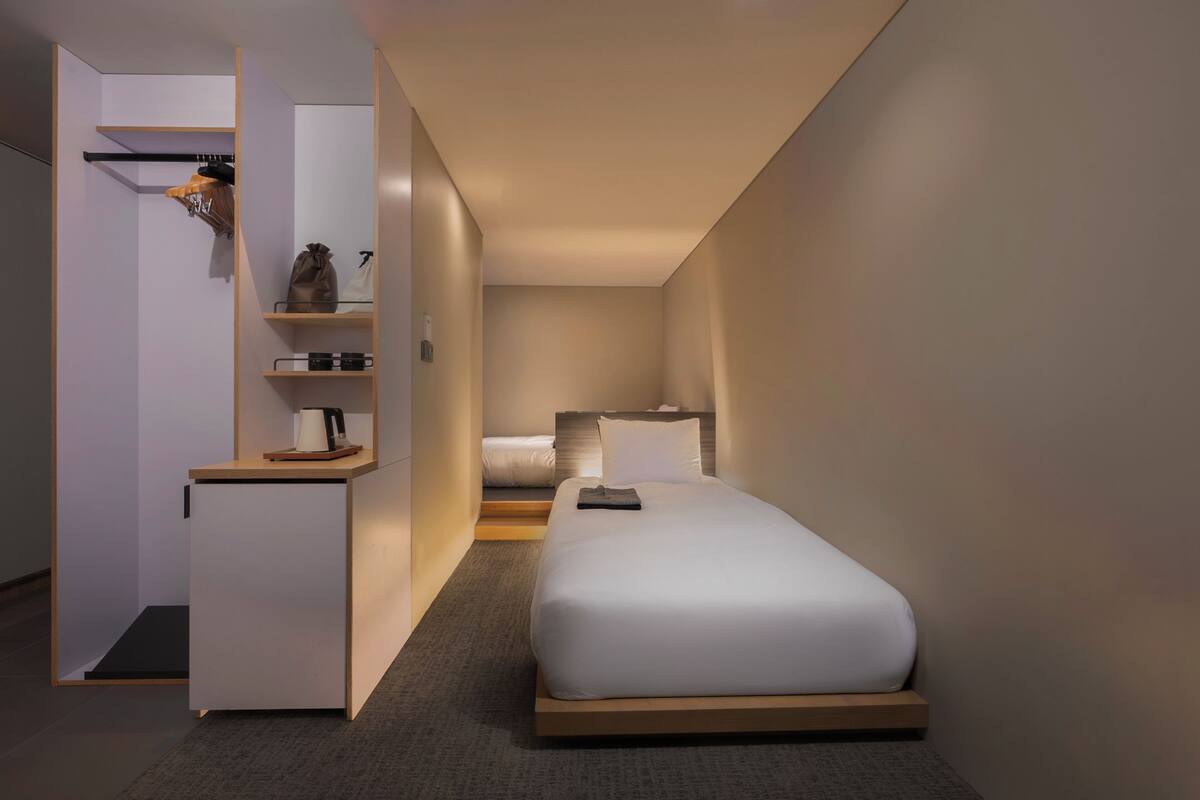 Habitación Deluxe con 2 camas individuales (Bathtub) | Ropa de cama de alta calidad, edredón y camas Select Comfort 
