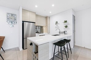 Fridge, microwave, oven, stovetop - Incredible Views in 2b Luxury Home in Meriton (Surfers Paradise)