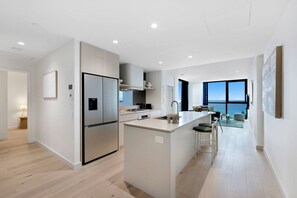 Fridge, microwave, oven, dishwasher - Oceanview Getaway | 2B Apartment. Pool. Parking (Mermaid Beach)