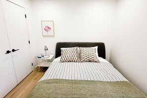 Iron/ironing board, internet, bed sheets - New, Sunny Two Bedroom Garden Suite in Prime Kitslano (Vancouver)