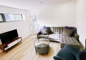Living area - New, Sunny Two Bedroom Garden Suite in Prime Kitslano (Vancouver)