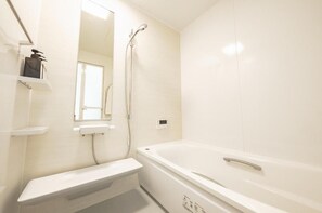 Appartamento, 1 camera da letto | Bagno | Set di cortesia gratuito, asciugacapelli, pantofole, asciugamani