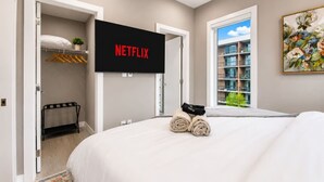 Desk, iron/ironing board, travel cot, WiFi - Brand New King Bed Condo w Gym Stampede & 17 Ave (Calgary)