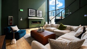 TV, stereo - Brand New King Bed Condo w Gym Stampede & 17 Ave (Calgary)