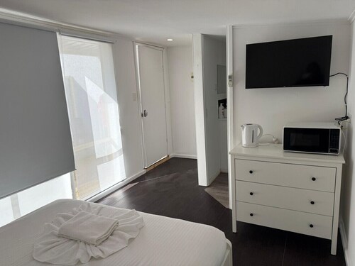 Cozy Budget Studio with AC and Private Bath