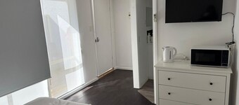 Cozy Budget Studio with AC and Private Bath