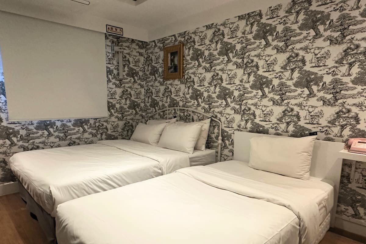 Habitación Deluxe con 2 camas individuales | Wifi gratis y ropa de cama