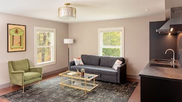 Suite Luxury, vista lago | Area soggiorno