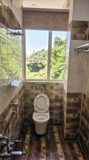 Basic Suite, Garden View | Bathroom | Separate bathtub and shower, towels, soap, shampoo - SPKA Jungle Resort  (Valparai)