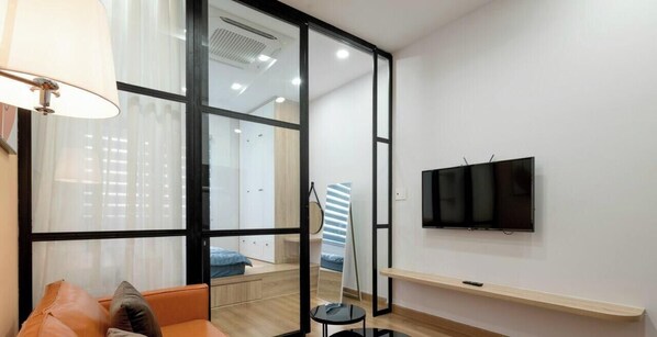 Apartamento, 1 cama King, cozinha, vista para a cidade | Parte interna