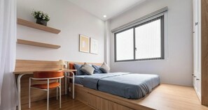 In-room safe, desk, laptop workspace, iron/ironing board - Nook Stay Phan Dinh Phung (Ho Chi Minh)