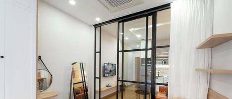 Apartment, 1 King Bed, Kitchen, City View | In-room safe, desk, laptop workspace, iron/ironing board