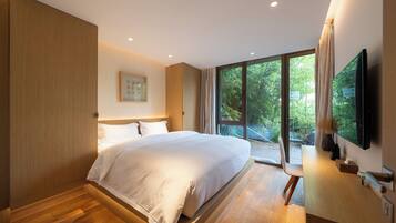 Superior Loft | Desk, laptop workspace, blackout curtains, soundproofing
