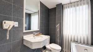 Suite Double Room | Bathroom | Shower, rainfall showerhead, free toiletries, hair dryer - Amory Hotel - Bui Vien Walking Street (Ben Thanh Ward)